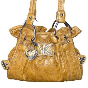 Kathy Van Zeeland Gold Puse